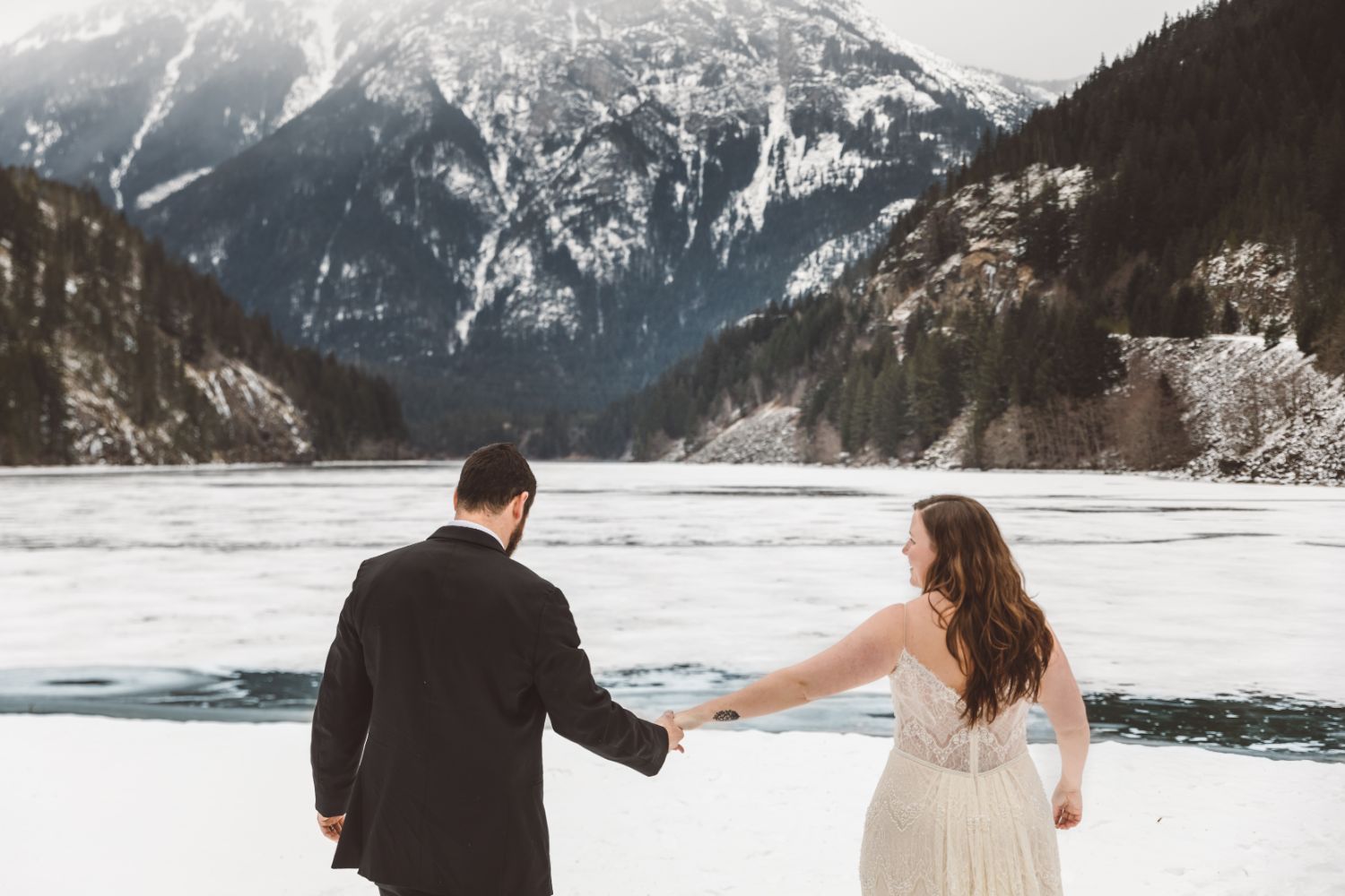 married-couple-hold-hands-north-cascades-adventure-elopement