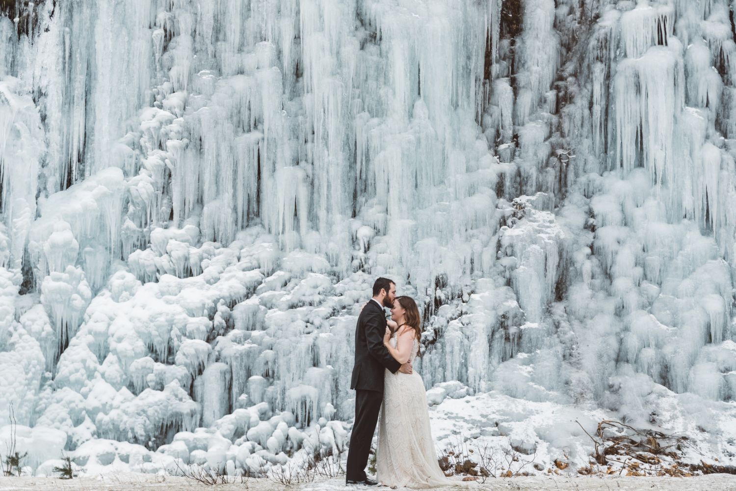 bride-groom-kiss-ice-waterfall-north-cascades