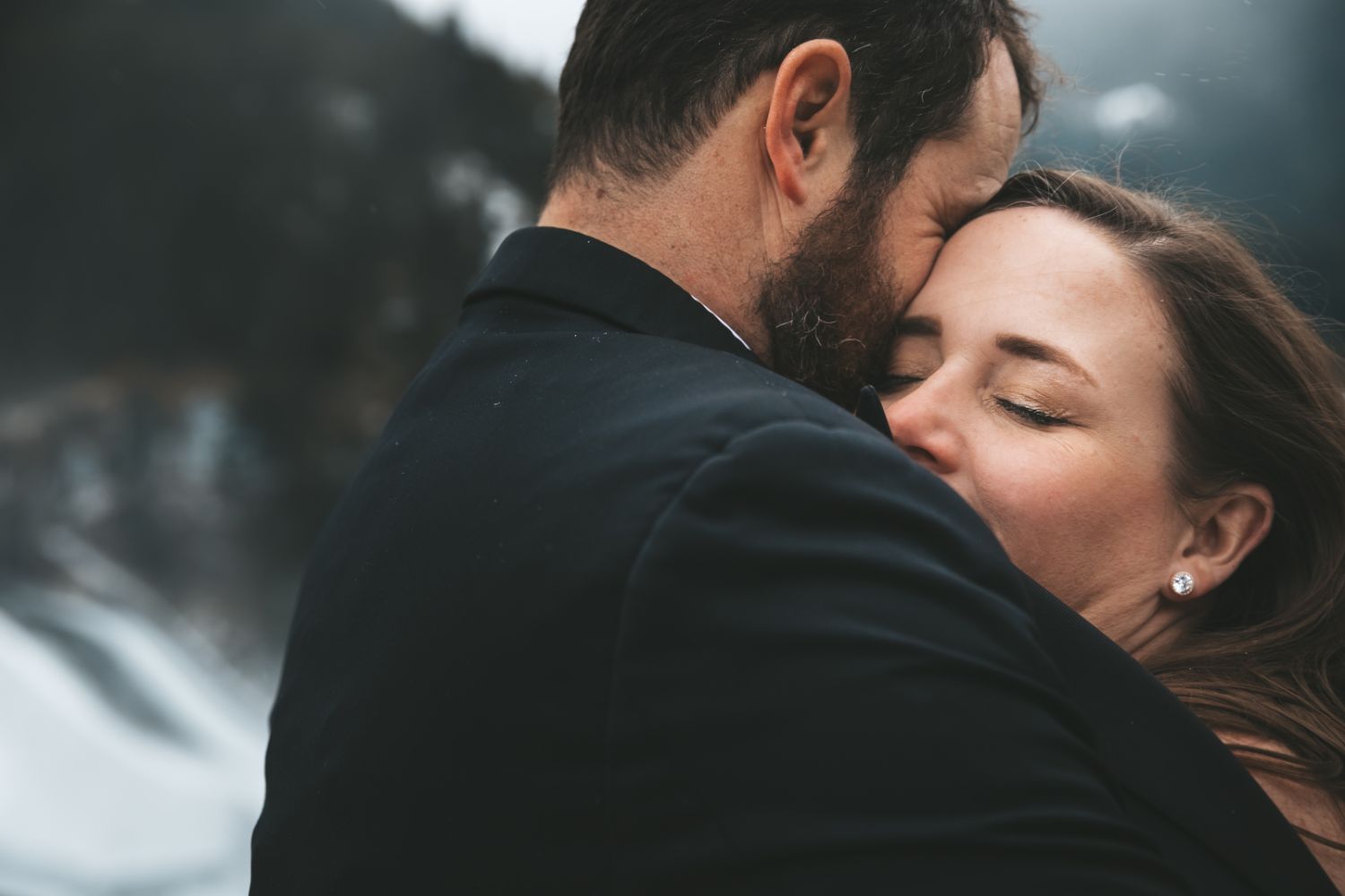 bride-warms-up-groom-embrace-winter-elopement-north-cascades