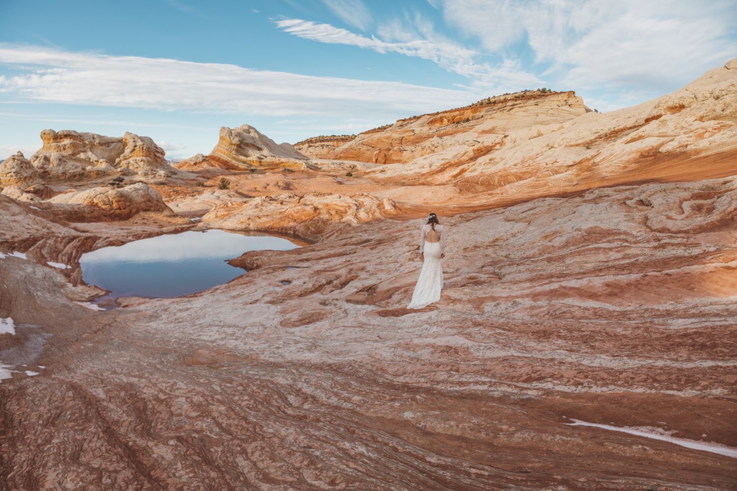 bride-walks-over-landscape-utah-backcountry-elopement-