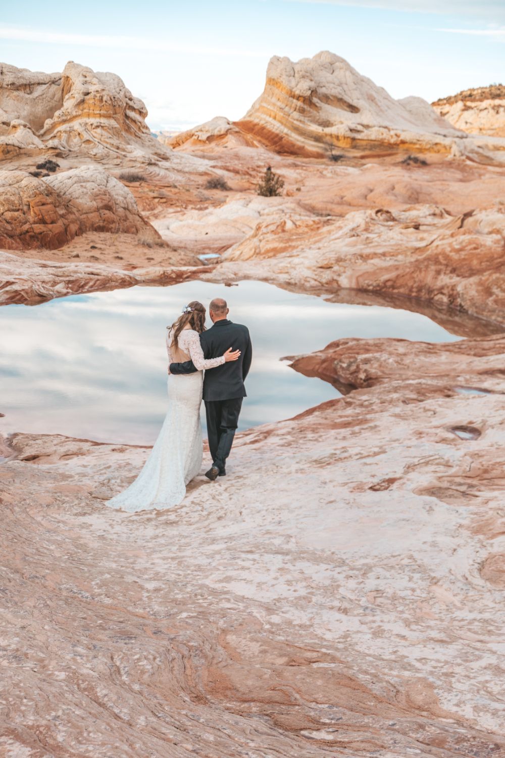 couple-embrace-utah-desert-adventure-wedding