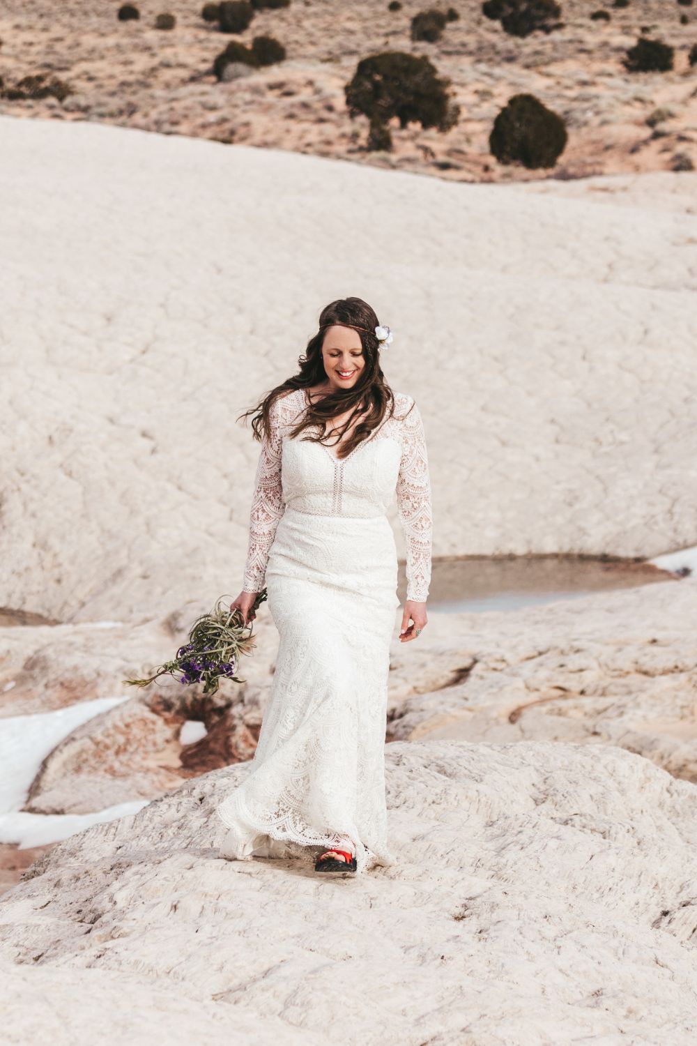 bride-walks-through-utah-desert