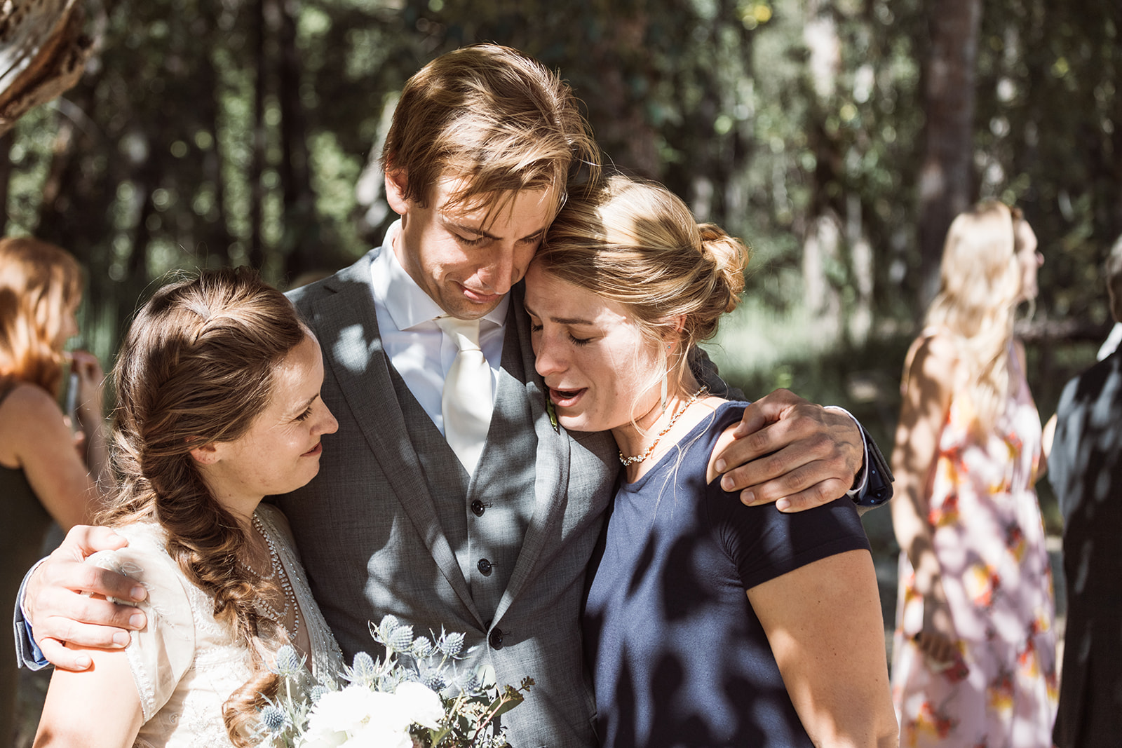 groom-hugs-bride-sister