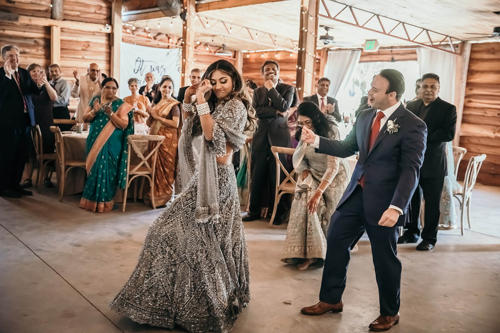  Bride and grooms dancing entrance into the barn to start the reception 