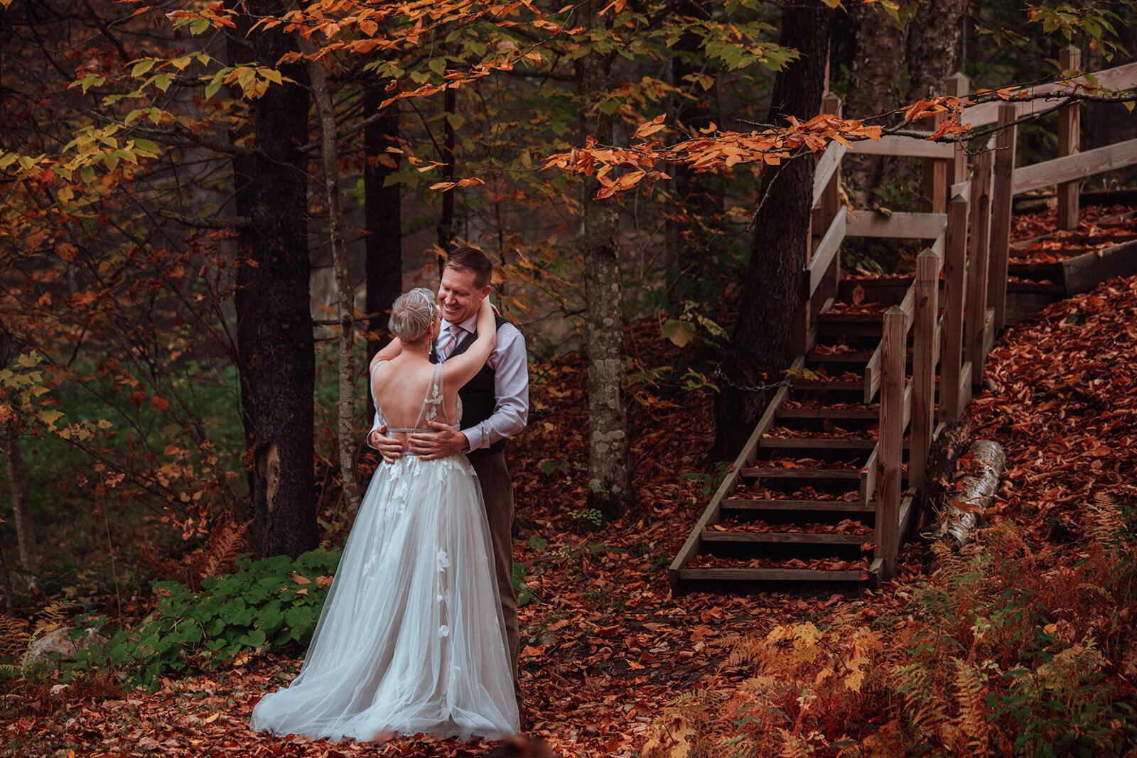  Bride and groom embrace after their first look while eloping in Vermont 