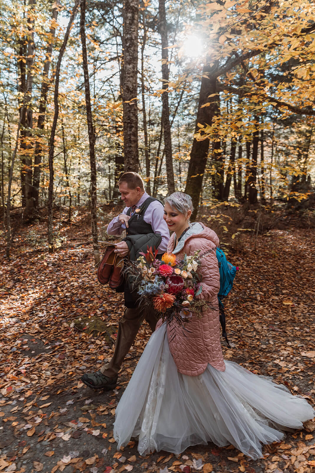  Couple hikes to their elopement ceremony spot at Warren Falls in Vermont 