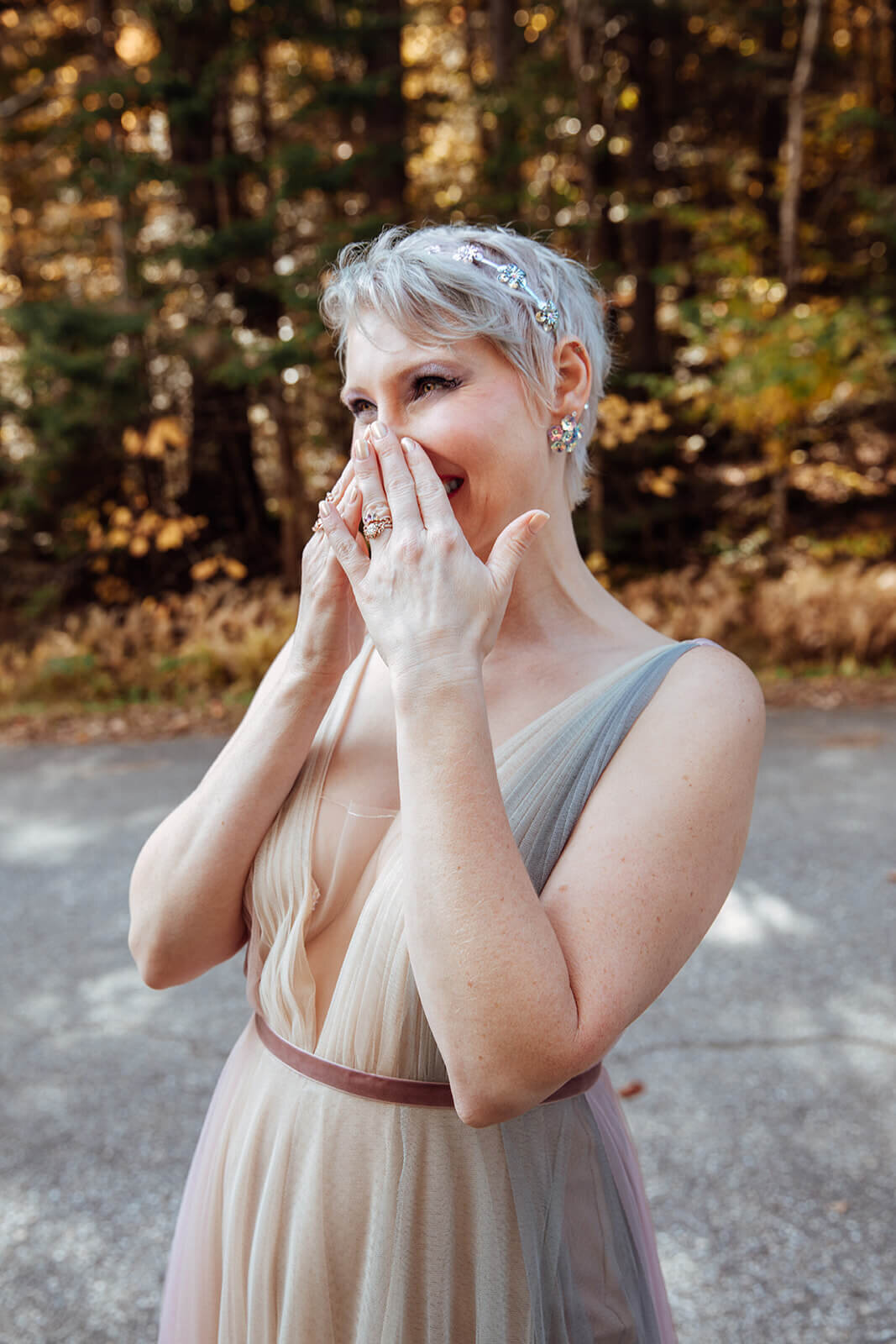  Bride reacts to her new husband seeing her in a rainbow dress at Texas Falls Recreation Area in Vermont 