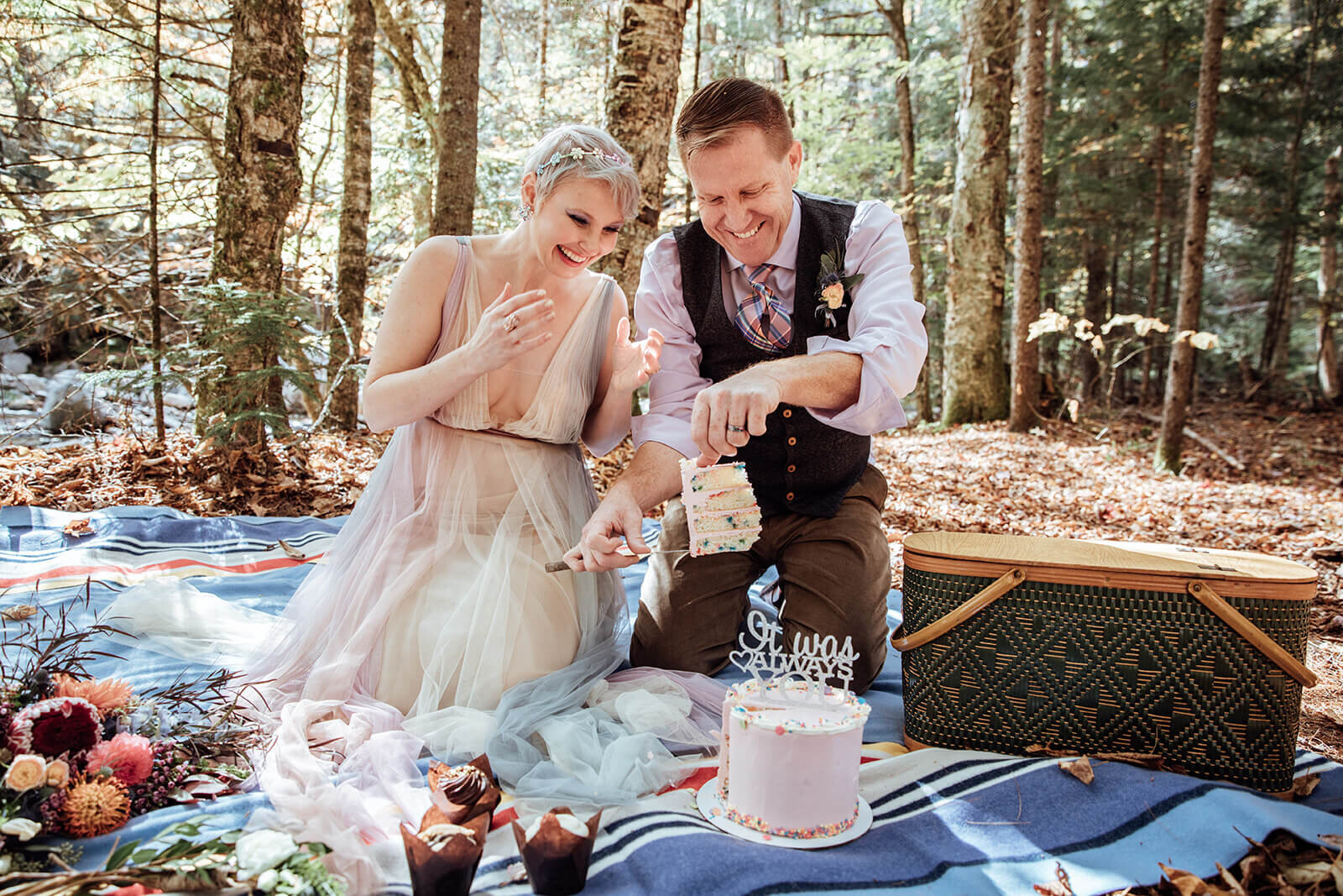  Bride and groom cut the cake at their picnic after a Vermont elopement 