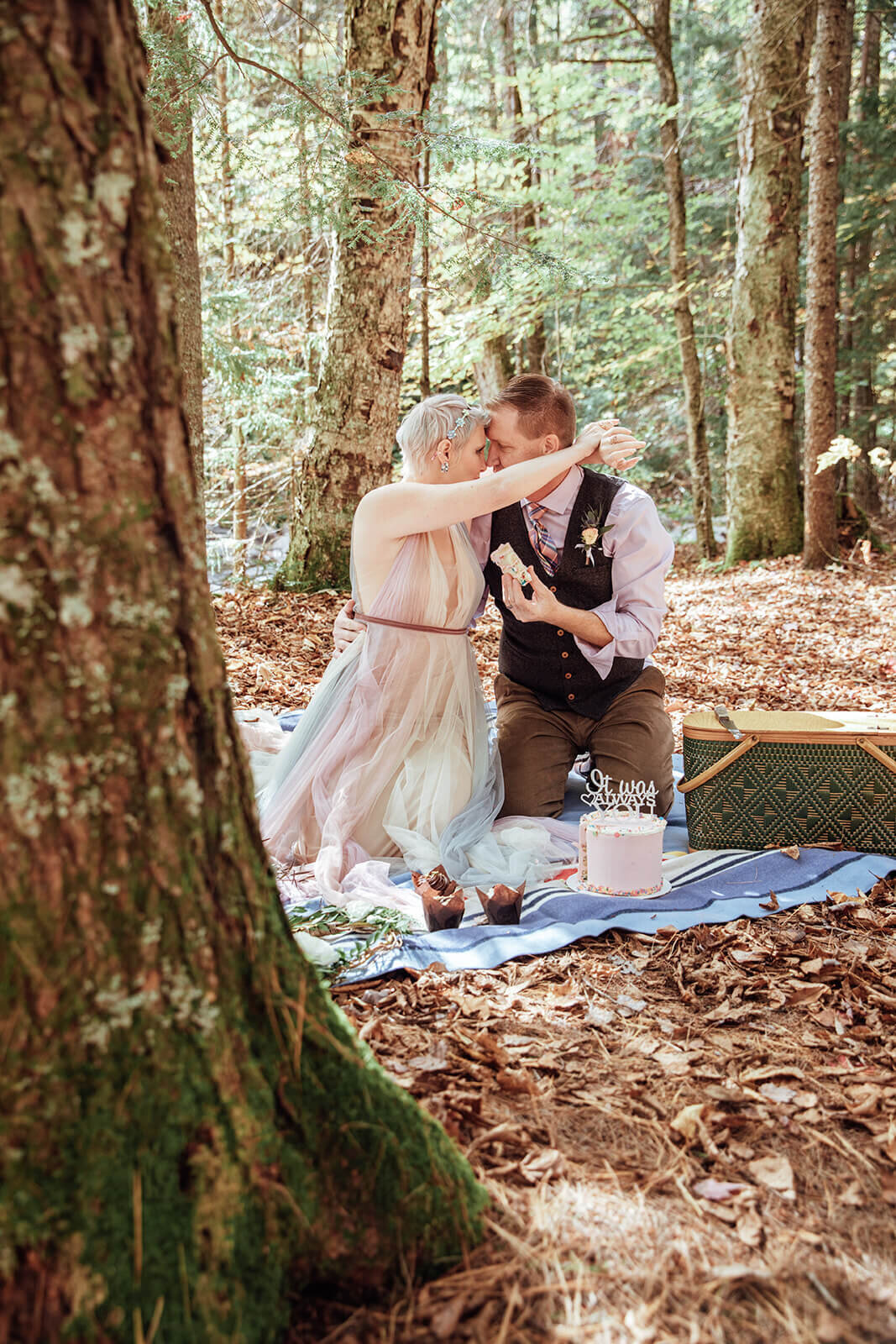  Bride and groom share a moment at their picnic after a Vermont elopement 