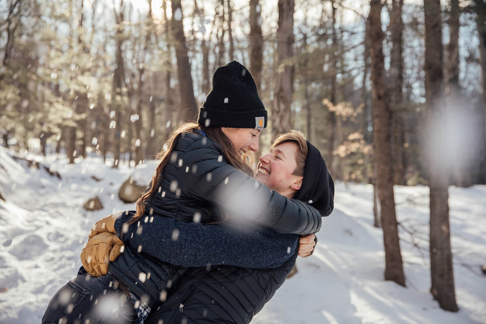  Couple hike Mt. Major in New Hampshire in the snow for their anniversary. New Hampshire elopement photographer 