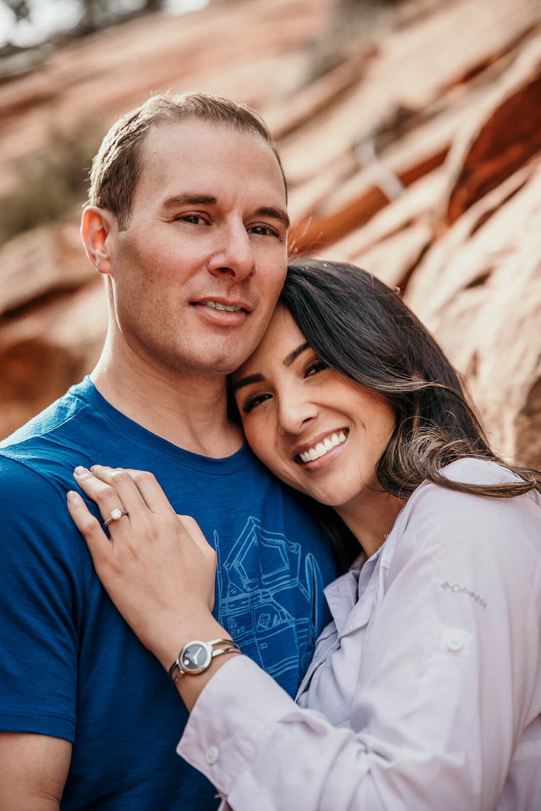  Eloping couple explore canyon outside of Zion National Park. Zion National Park engagement photographer 