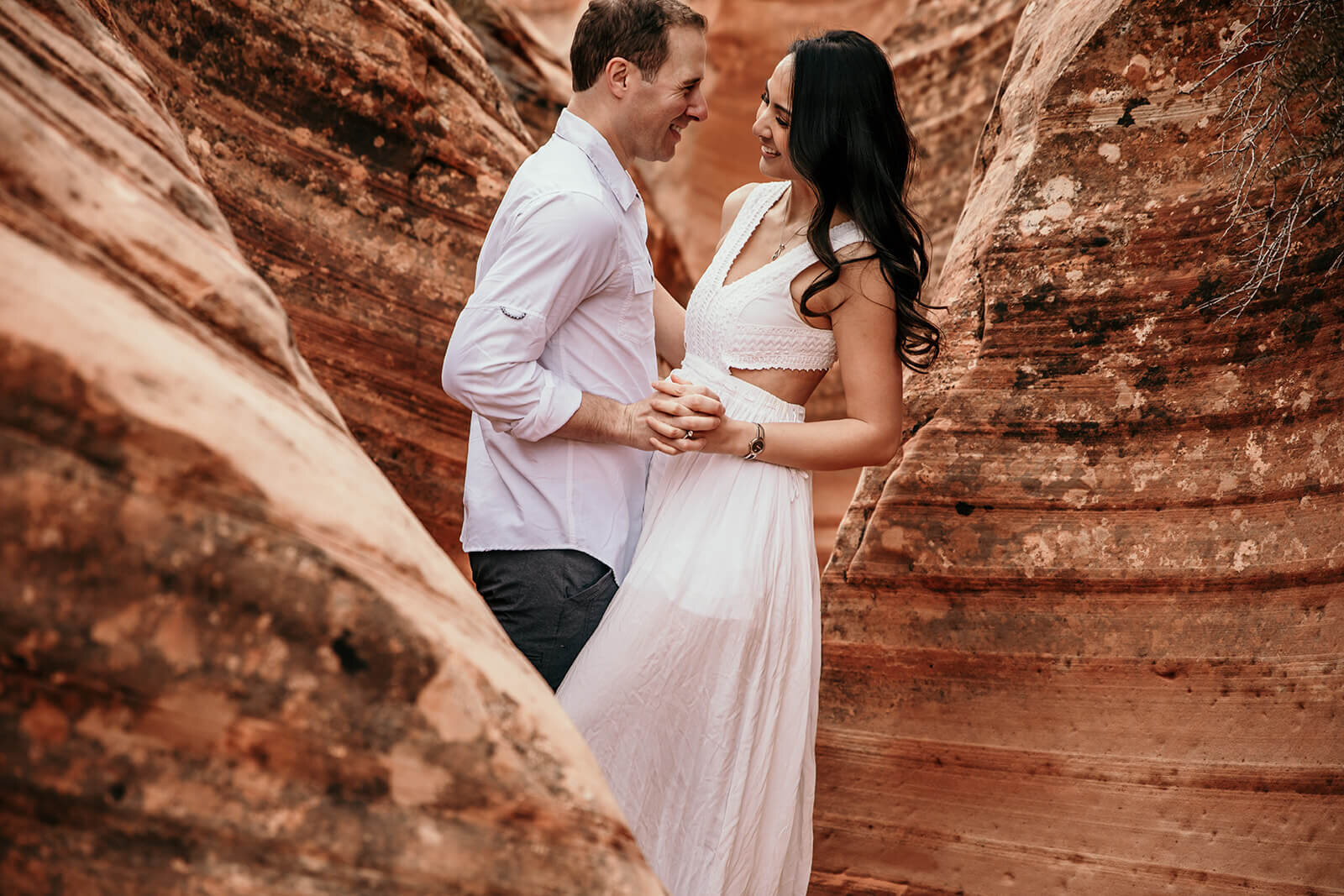  Eloping couple explore canyon outside of Zion National Park. Zion National Park elopement photographer 