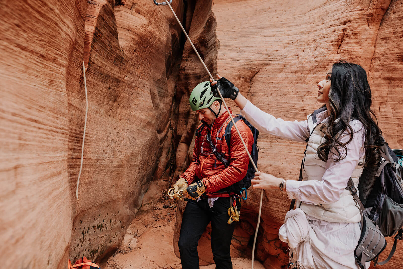  Eloping couple explore and rappel in a technical canyon outside of Zion National Park. Zion National Park Utah elopement photographer 