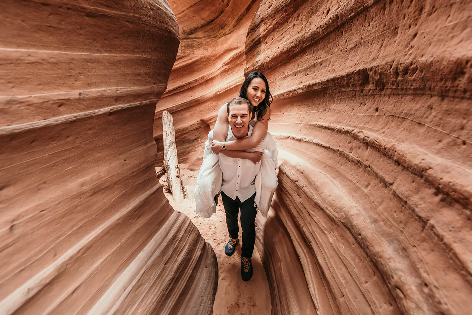  Eloping couple explore a technical canyon outside of Zion National Park. Zion National Park, Utah elopement photographer 