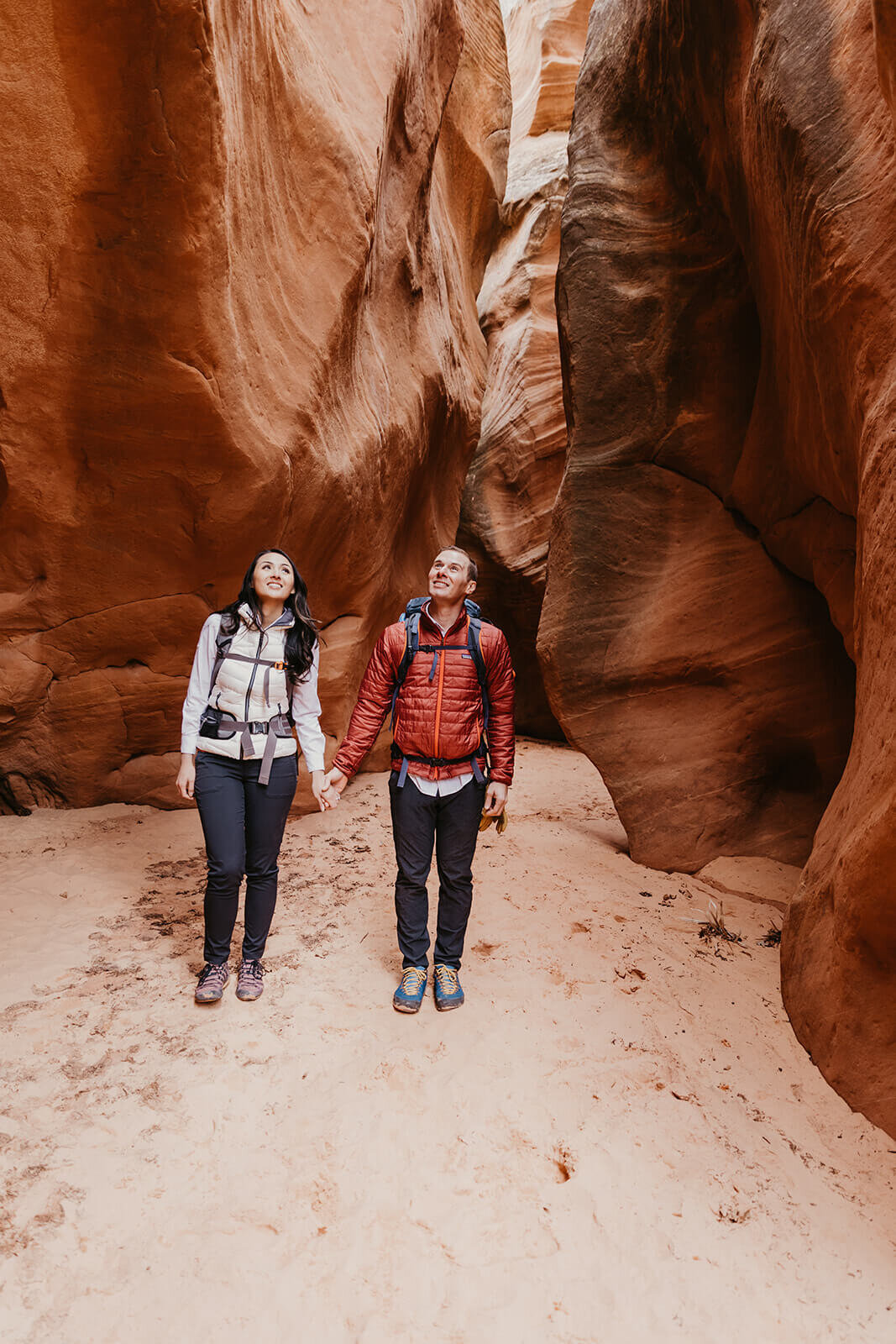  Eloping couple explore a technical canyon outside of Zion National Park. Zion National Park, Utah engagement photographer 