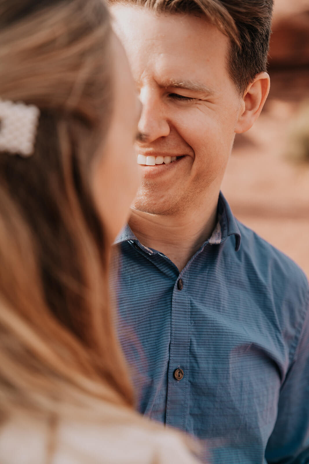  Couple celebrates anniversary at Dead Horse Point State Park and the La Sal Mountains near Moab, Utah with incredible views and hiking. Utah anniversary photographer 