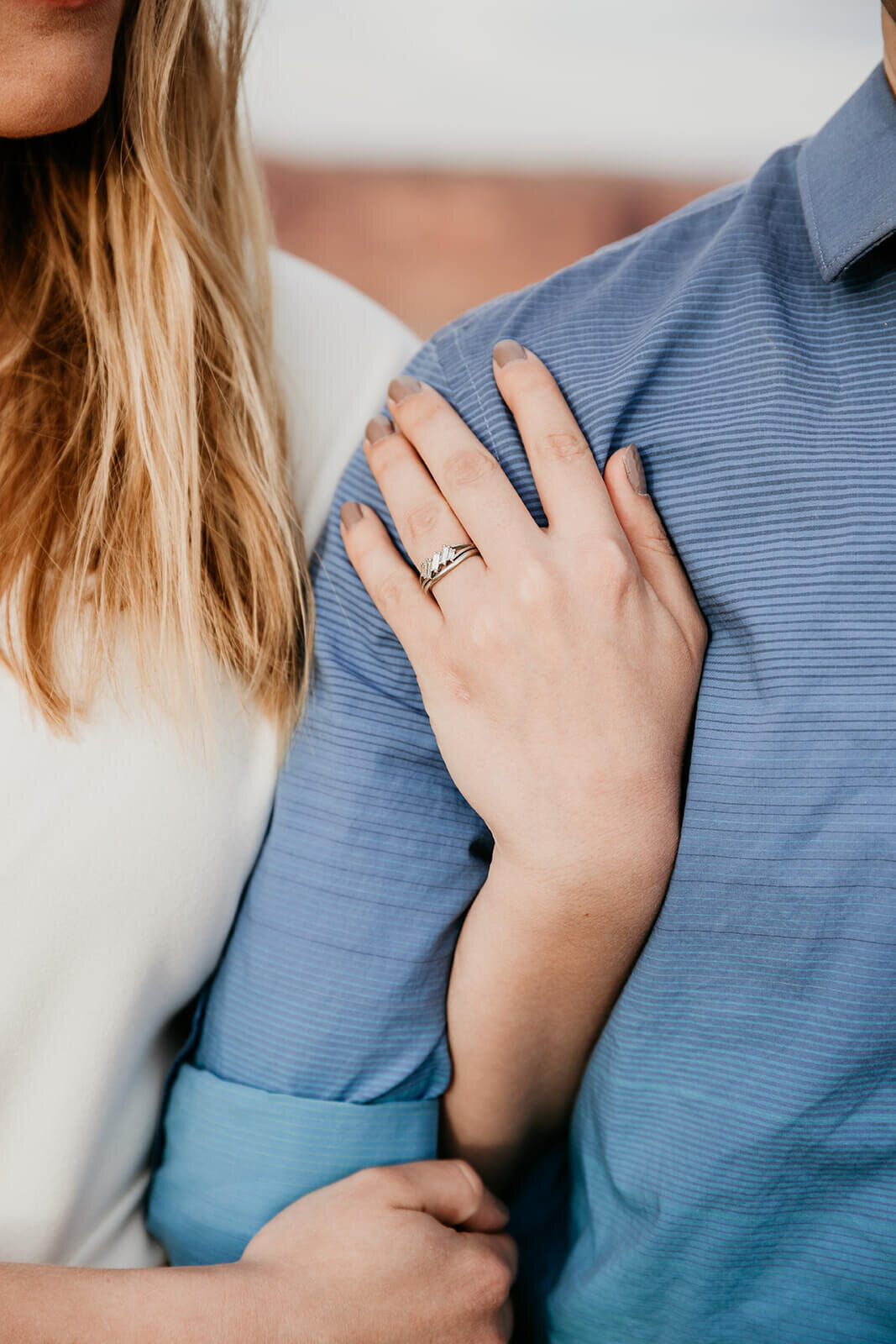  Bride shows off her ring during anniversary photoshoot at Dead Horse Point in Moab, Utah. 