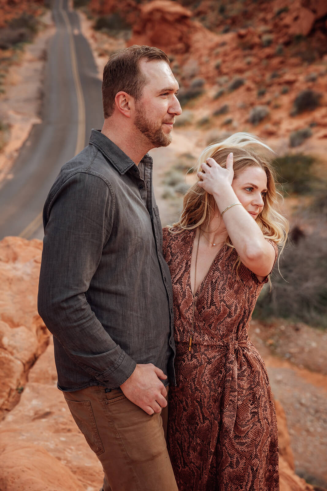  Couple explores Valley of Fire State Park next to Lake Mead, outside of Las Vegas, Nevada. Las Vegas elopement photographer 