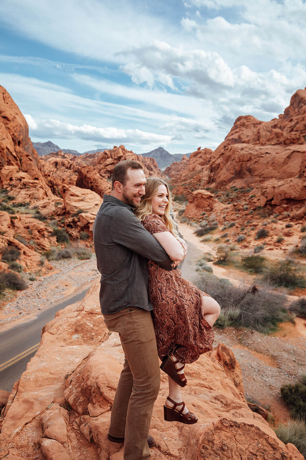  Couple explores Valley of Fire State Park next to Lake Mead, outside of Las Vegas, Nevada. Nevada elopement photographer 