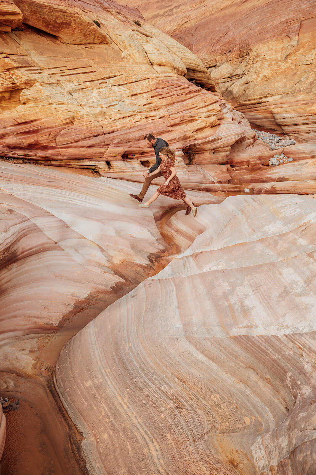  Couple snuggles in Valley of Fire State Park next to Lake Mead, outside of Las Vegas, Nevada. Las Vegas wedding photographer 