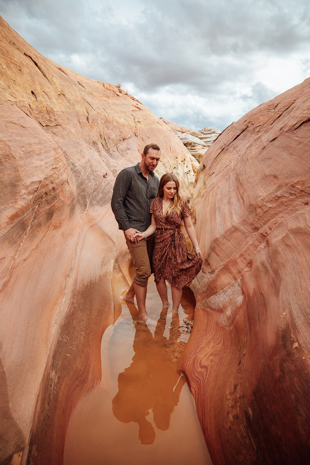  Couple snuggles in Valley of Fire State Park next to Lake Mead, outside of Las Vegas, Nevada. Nevada wedding photographer 