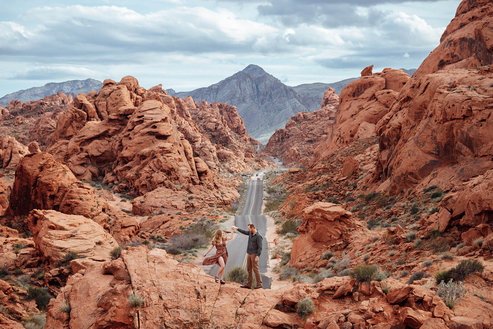  Couple explores Valley of Fire State Park next to Lake Mead, outside of Las Vegas, Nevada. Las Vegas elopement photographer 