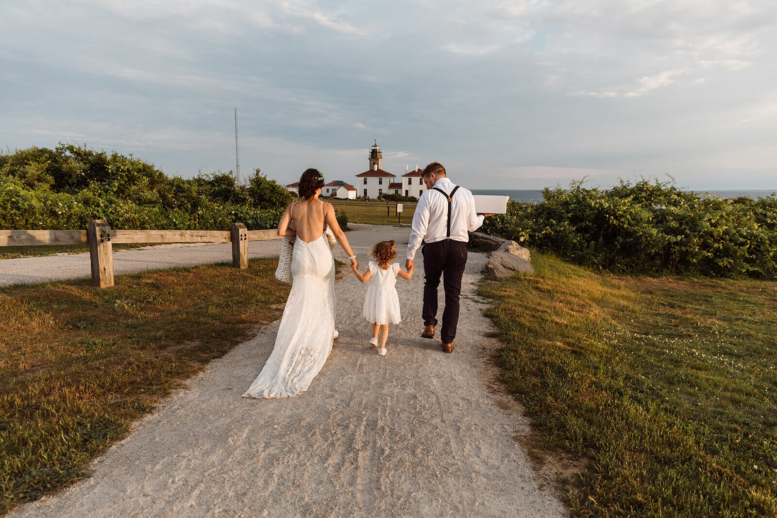  Couple elope at Beavertail Lighthouse in Rhode Island and involve their daughter in the day. 