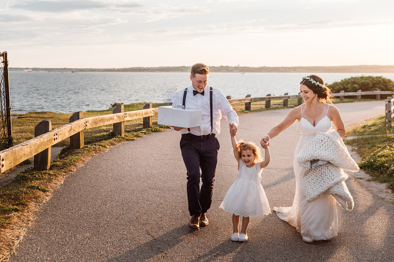  Couple elope at Beavertail Lighthouse in Rhode Island and involve their daughter in the day. 