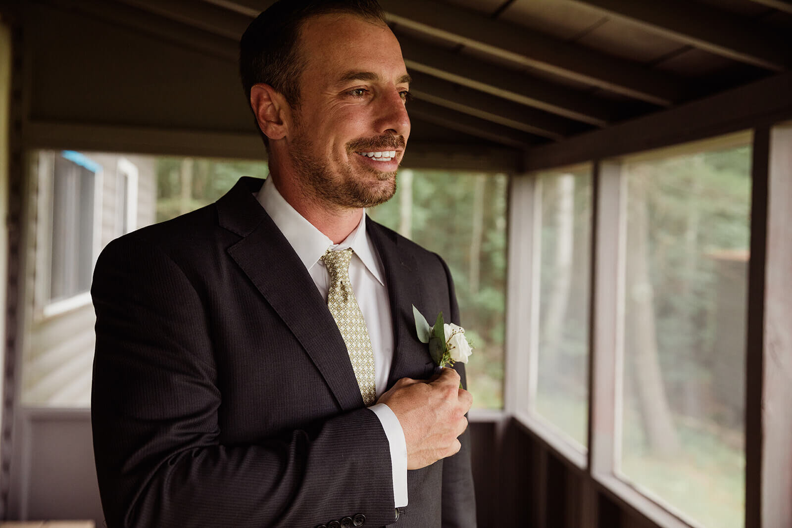  Groom getting ready. Small outdoor wedding in Maine. 