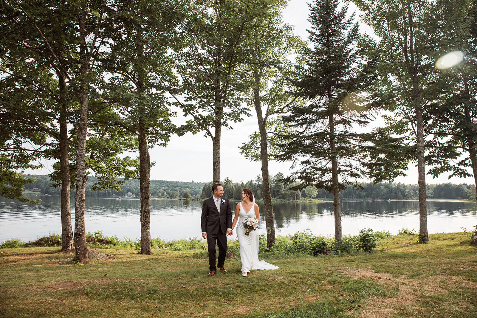  Couple’s portraits after a small outdoor wedding on a lake in Maine. 