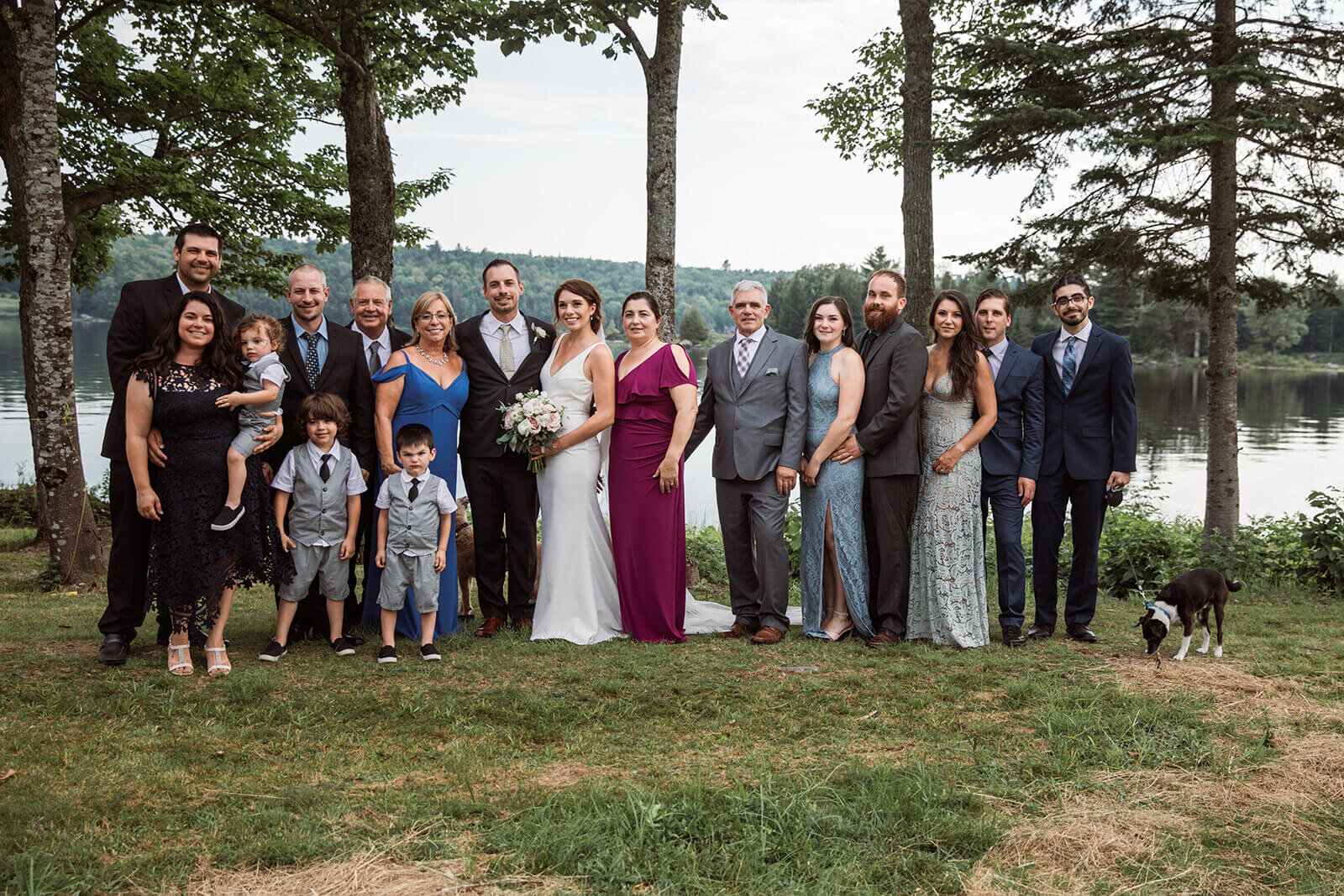  Family portraits after a small outdoor wedding on a lake in Maine. 