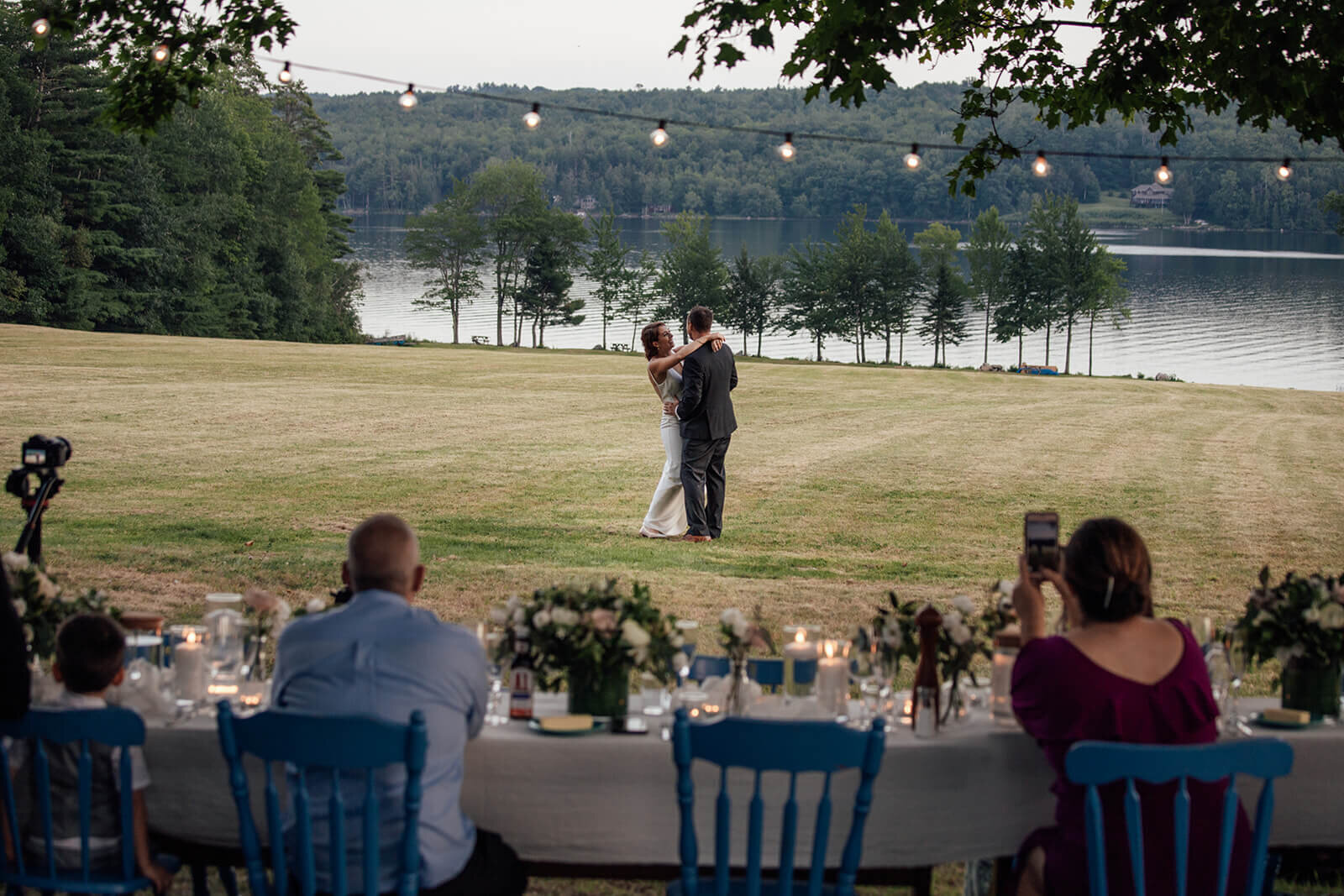  First dance for newly married couple at Grace on the Lake in Maine after their elopement with family. 