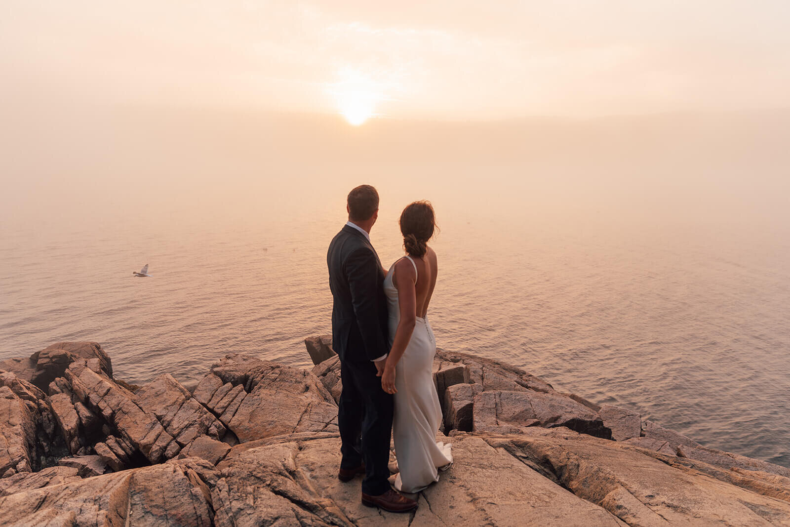  Sunset during a couple’s elopement on the coast in Acadia National Park, Maine. 