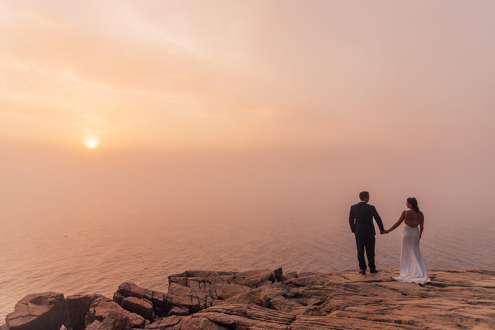  Sunset during a couple’s elopement on the coast in Acadia National Park, Maine. 