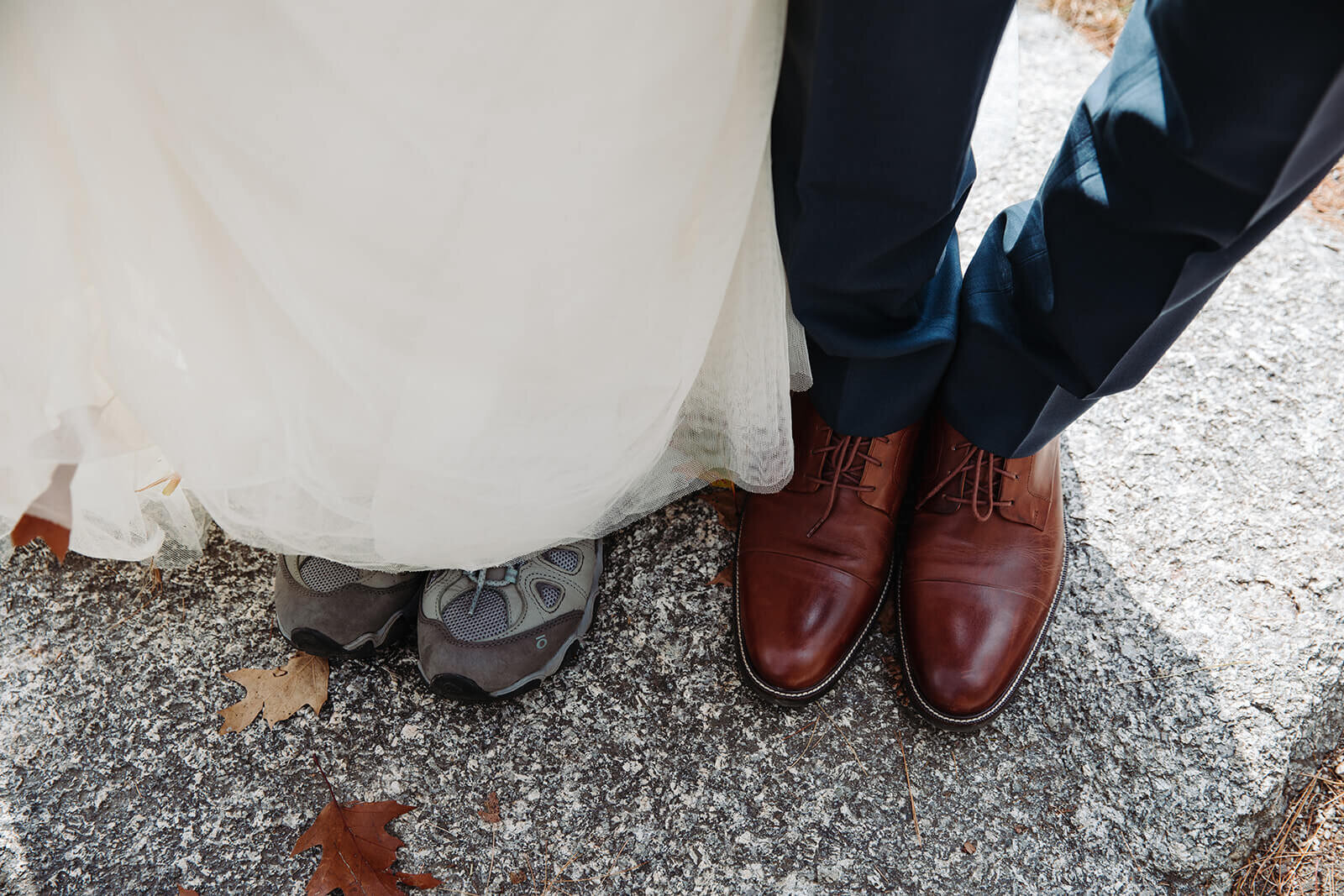  Hiking shoes during elopement in the White Mountains in New Hampshire. New Hampshire elopement 