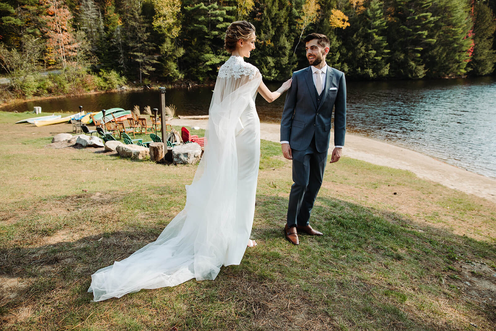  First look between the couple at their lake lodge during their small outdoor wedding in the Adirondacks in Upstate NY.  Upstate NY small wedding venues. Upstate New York wedding packages. 