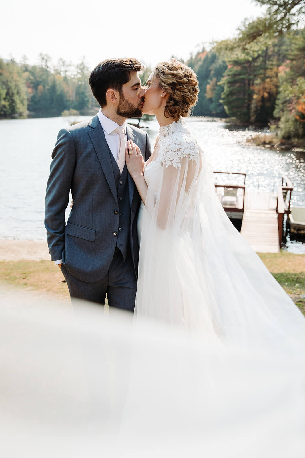  First look between the couple at their lake lodge during their small outdoor wedding in the Adirondacks in Upstate NY.  Upstate NY small wedding venues. Upstate New York wedding packages. 