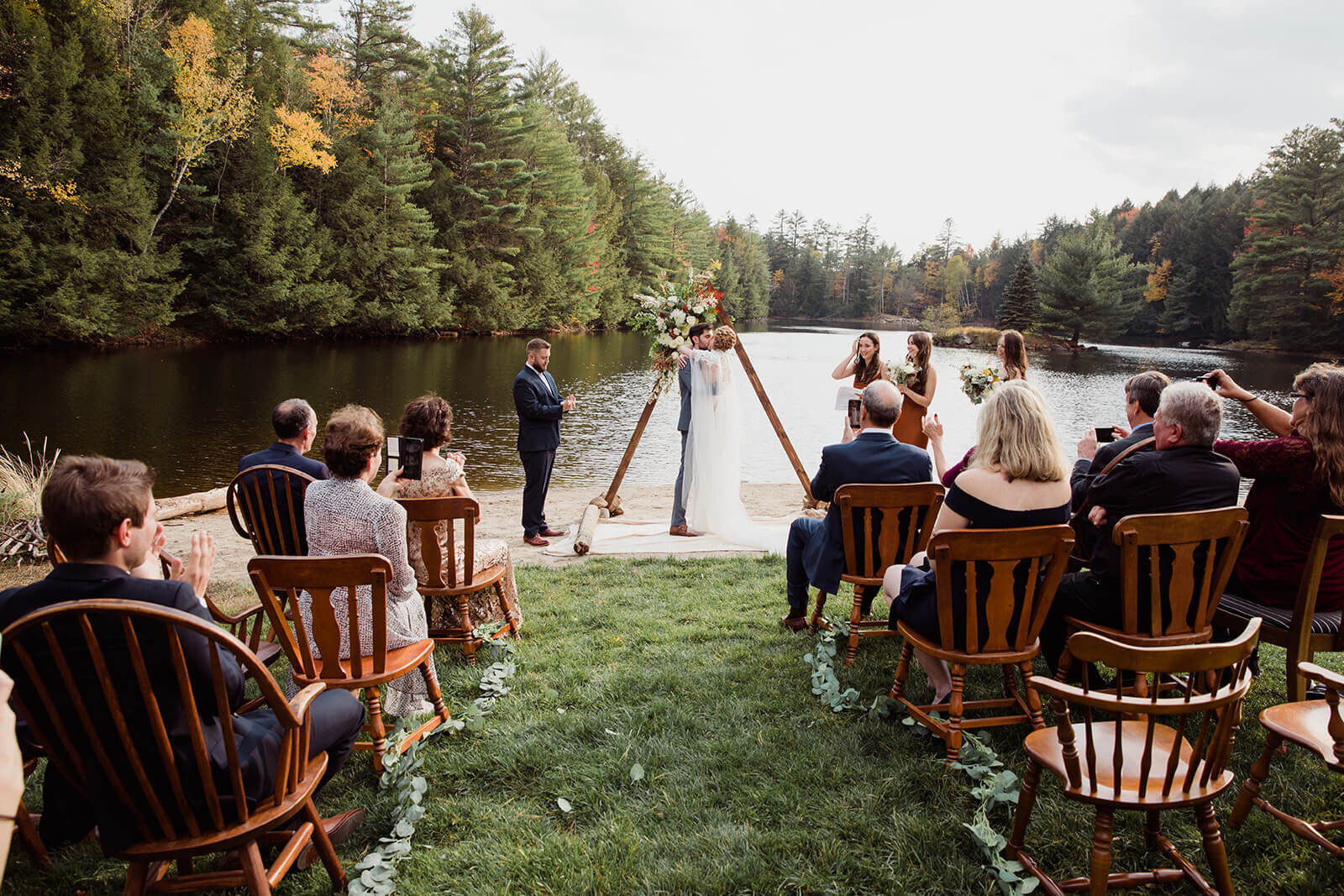  Small outdoor wedding on lake beach during the fall in the Adirondacks in Upstate New York. New York wedding packages. Upstate NY elopement packages. 