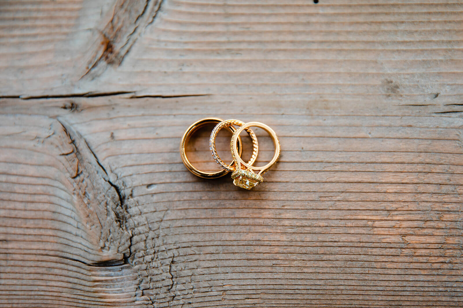  Wedding rings including the bride’s gorgeous yellow diamond ring. Adirondack small outdoor wedding Upstate NY. 