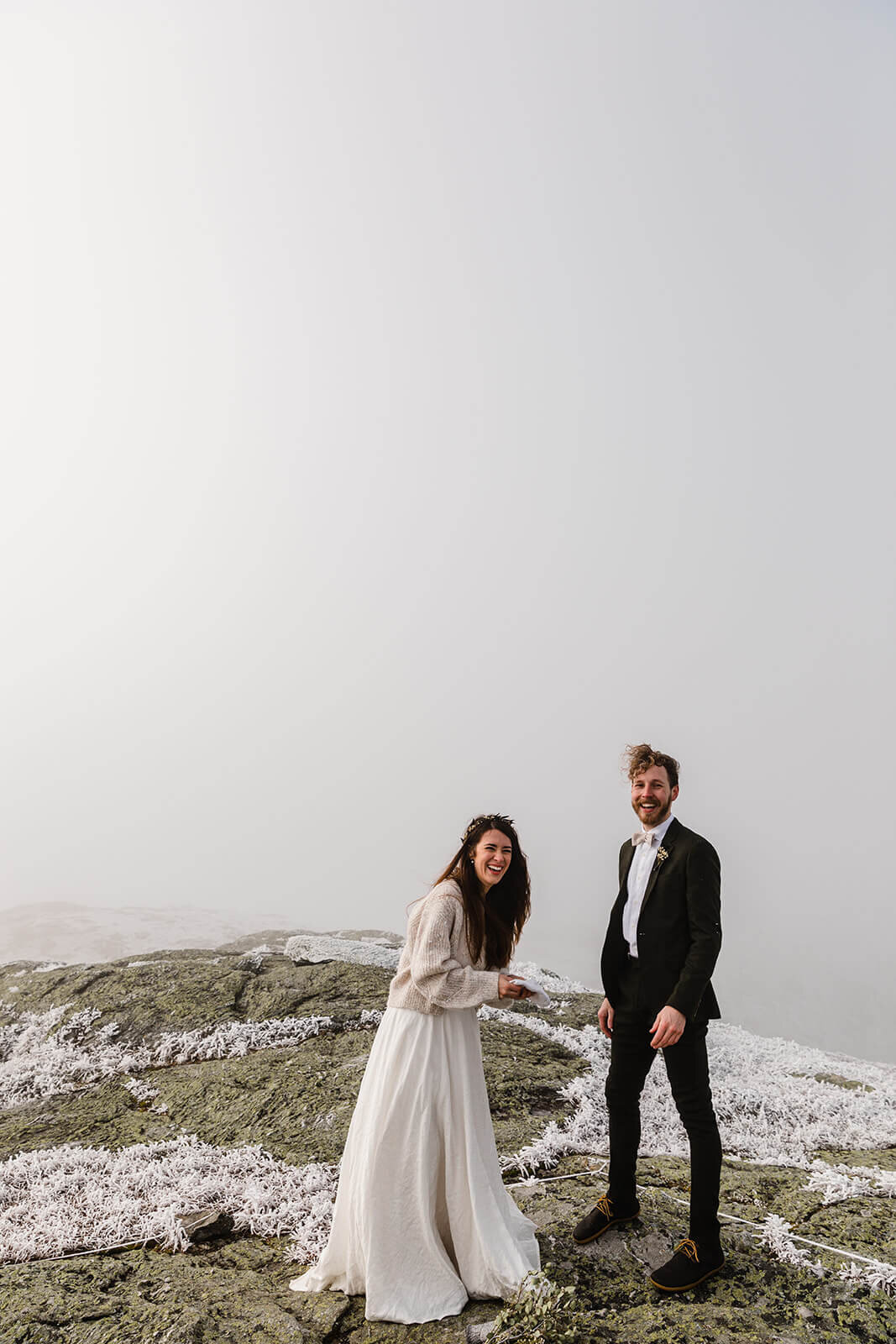  Eloping couple has ceremony in frosty conditions during their adventure elopement on Mt. Mansfield, Vermont’s tallest mountain.  Vermont mountain wedding. Vermont winter elopement. Vermont elopement packages. 