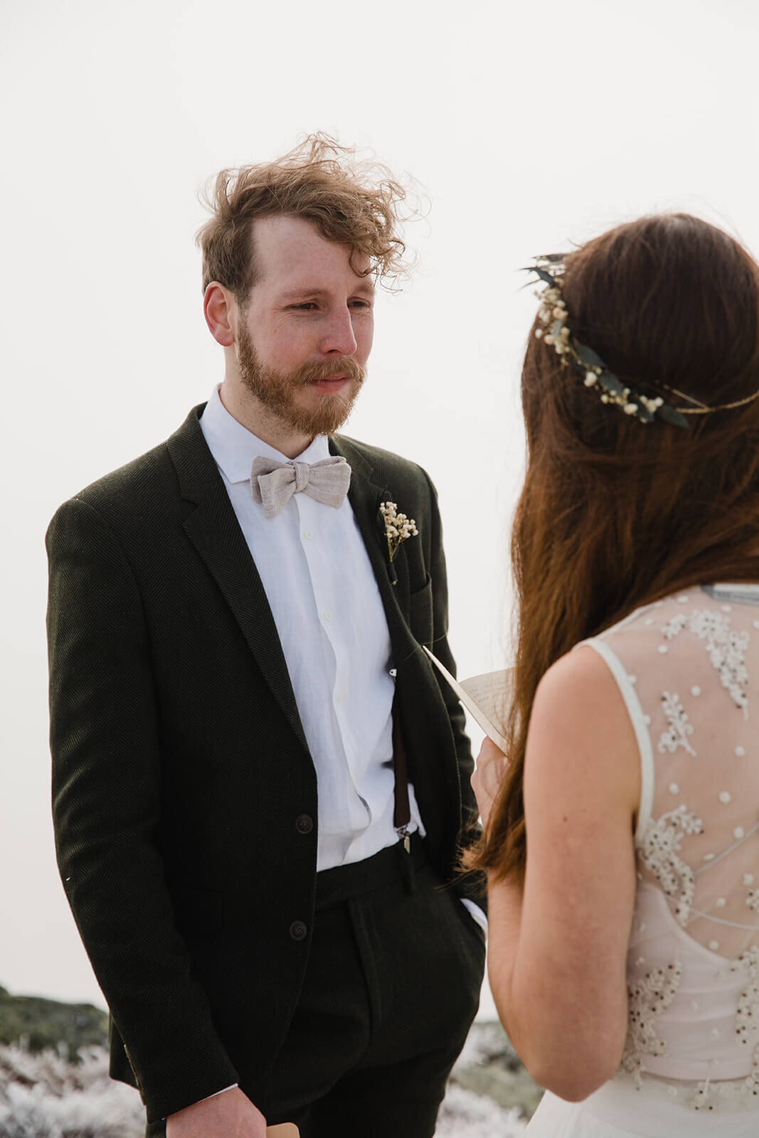  Eloping couple has ceremony in frosty conditions during their adventure elopement on Mt. Mansfield, Vermont’s tallest mountain.  Vermont mountain wedding. Vermont winter elopement. Vermont elopement packages. 