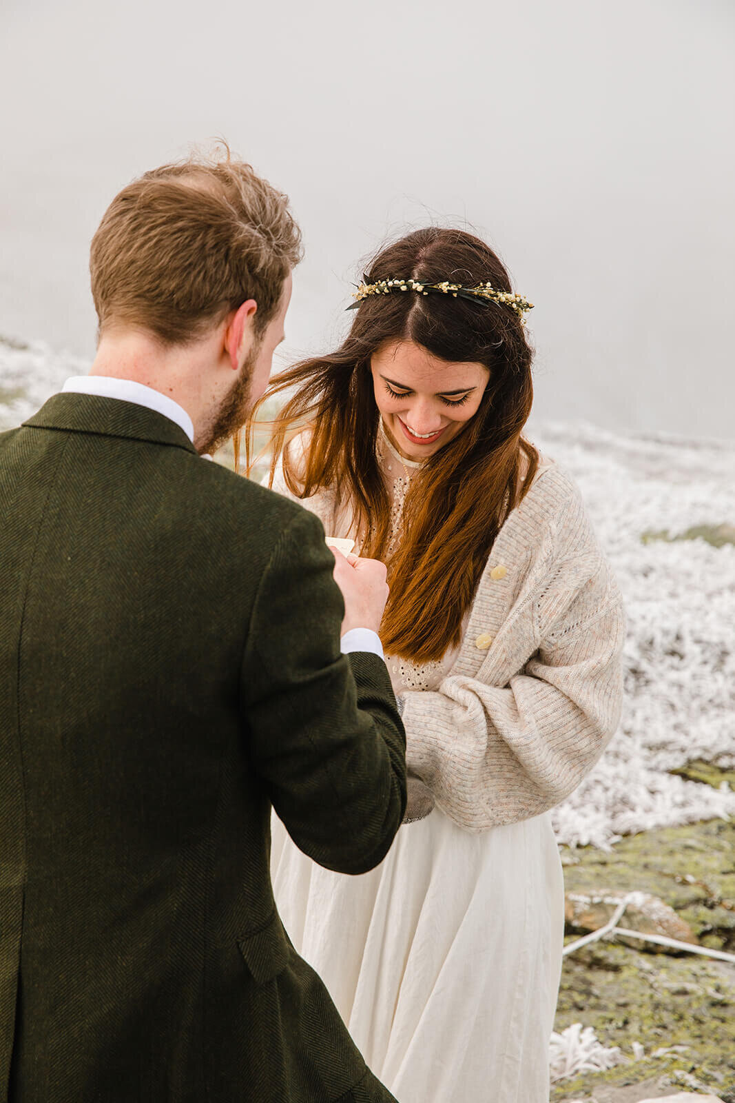  Eloping couple exchanges vows in frosty conditions during their adventure elopement on Mt. Mansfield, Vermont’s tallest mountain.  Vermont mountain wedding. Vermont winter elopement. Vermont elopement packages. 