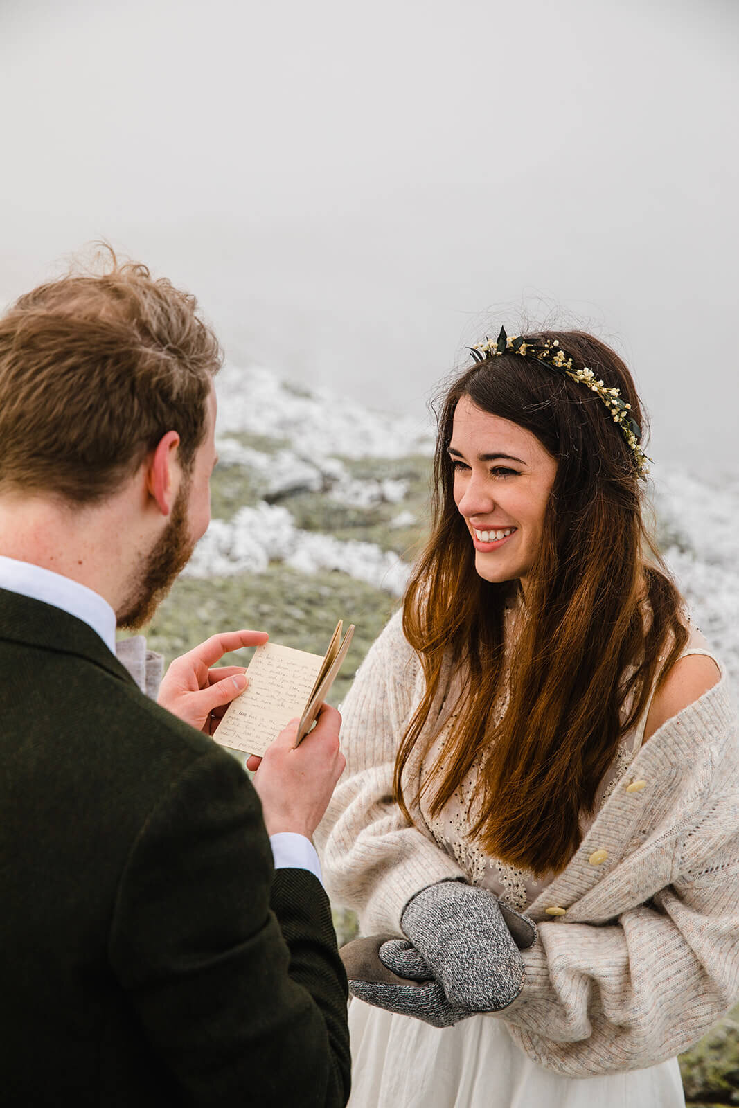  Eloping couple exchanges vows in frosty conditions during their adventure elopement on Mt. Mansfield, Vermont’s tallest mountain.  Vermont mountain wedding. Vermont winter elopement. Vermont elopement packages. 