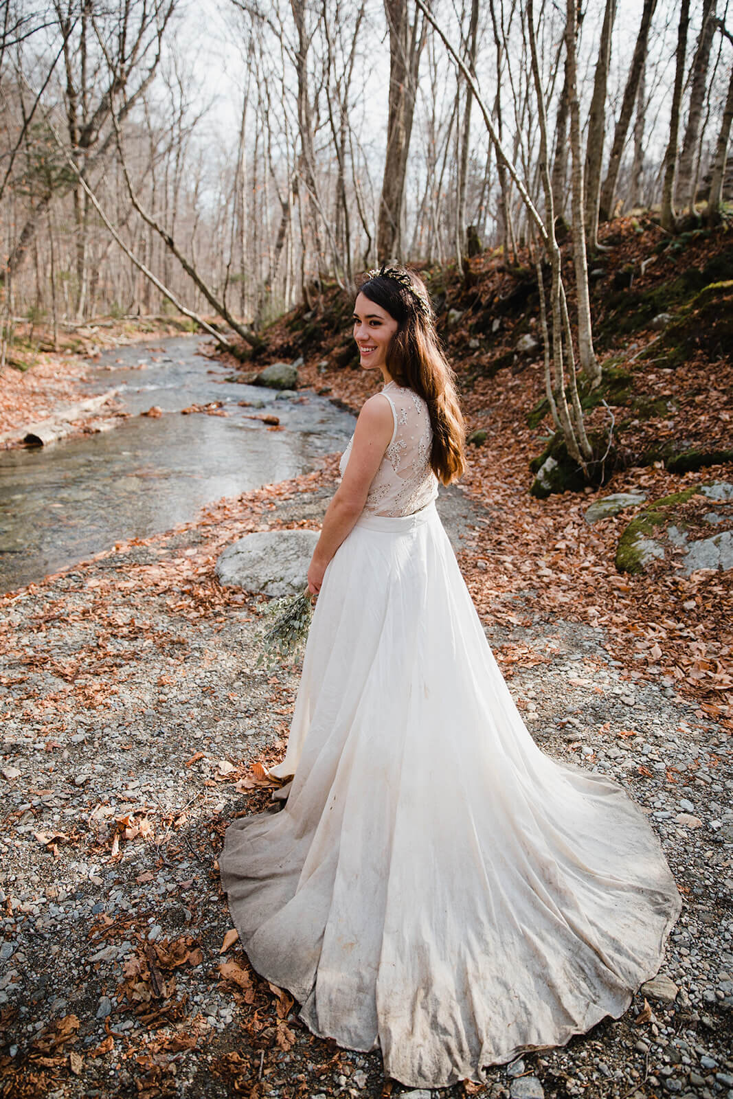  Eloping couple explores trail during their adventure elopement on Mt. Mansfield, Vermont’s tallest mountain.  Vermont mountain wedding. Vermont winter elopement. Vermont elopement packages. 