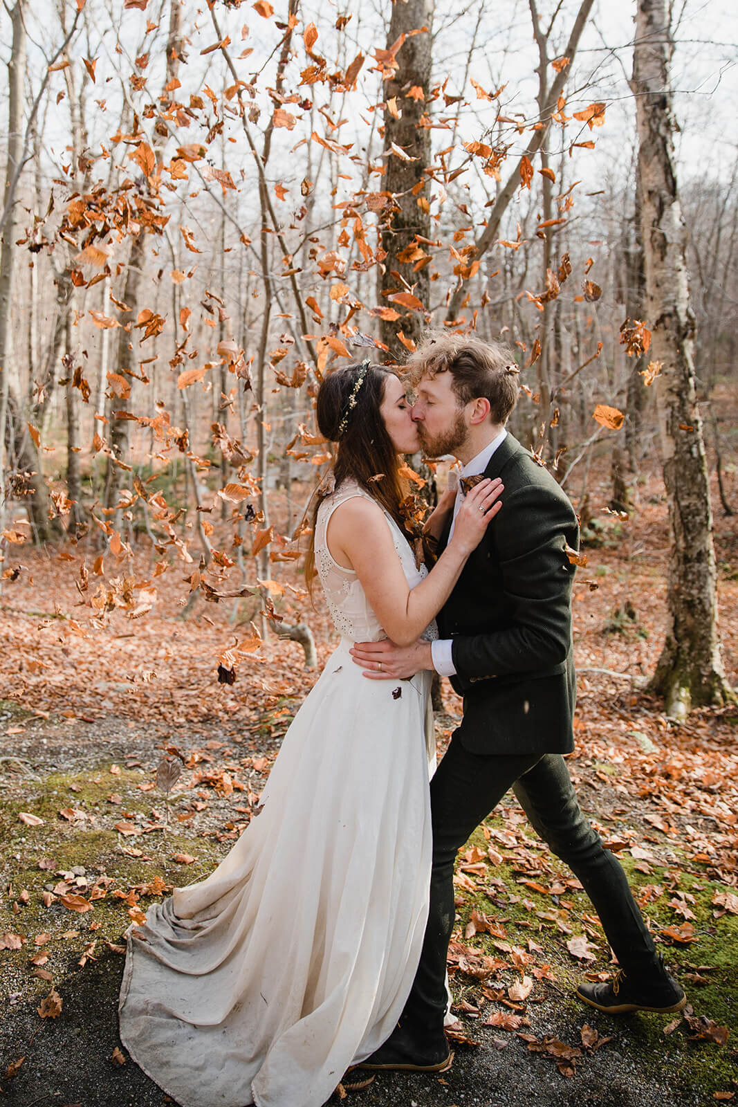  Eloping couple explores trail during their adventure elopement on Mt. Mansfield, Vermont’s tallest mountain.  Vermont mountain wedding. Vermont winter elopement. Vermont elopement packages. 