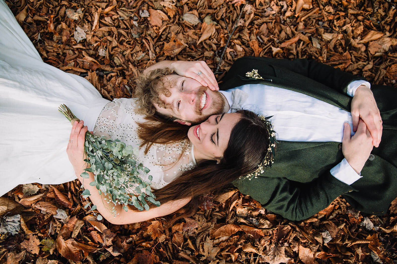  Eloping couple explores trail during their adventure elopement on Mt. Mansfield, Vermont’s tallest mountain.  Vermont mountain wedding. Vermont winter elopement. Vermont elopement packages. 