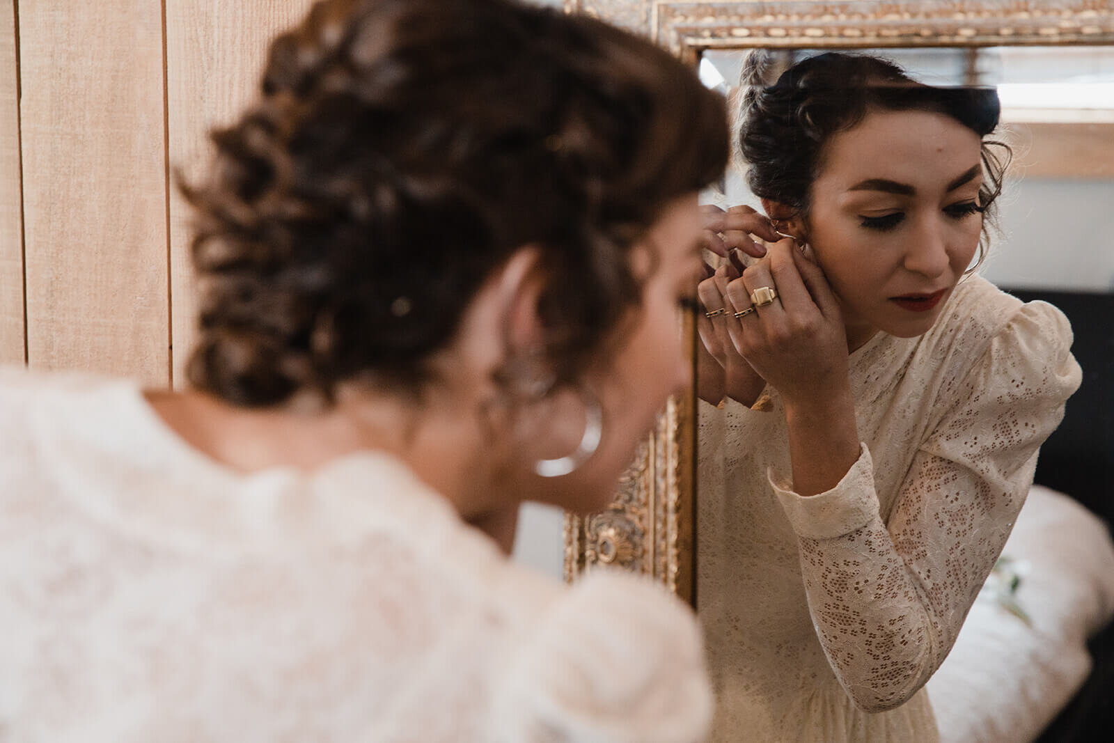  Stylish NYC couple elope late winter in the Finger Lakes region of Upstate NY. Bride gets ready. 