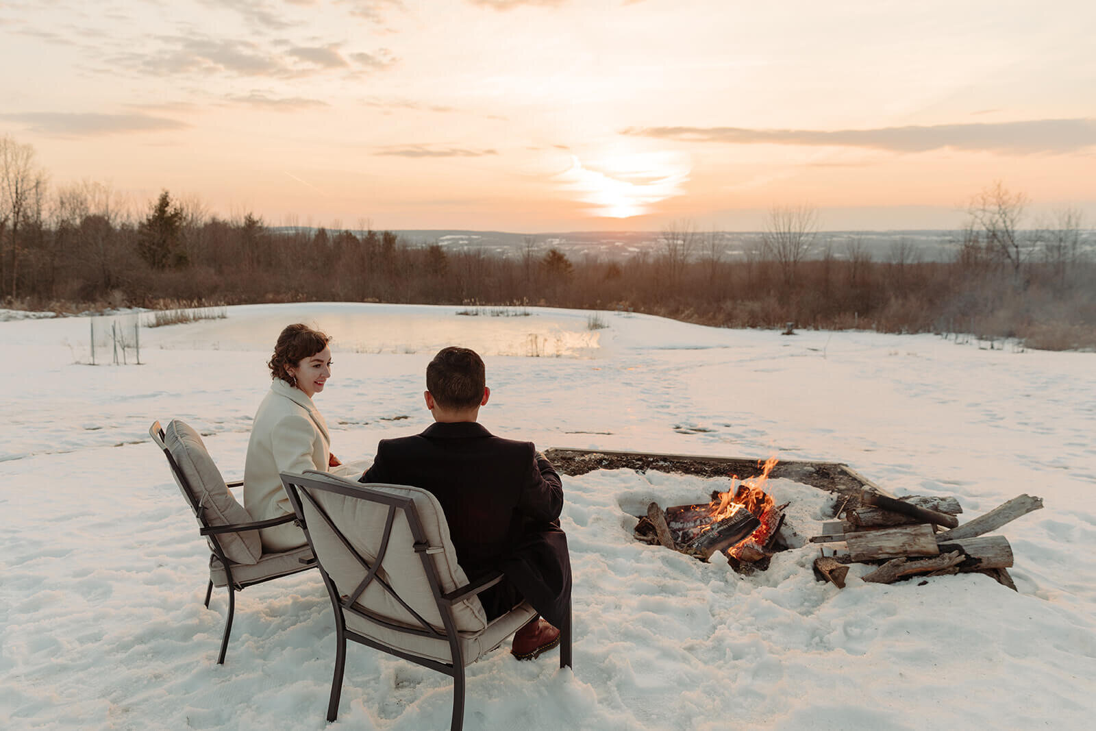  Stylish NYC couple elope late winter in the Finger Lakes region of Upstate NY.  Hot toddies by the campfire 