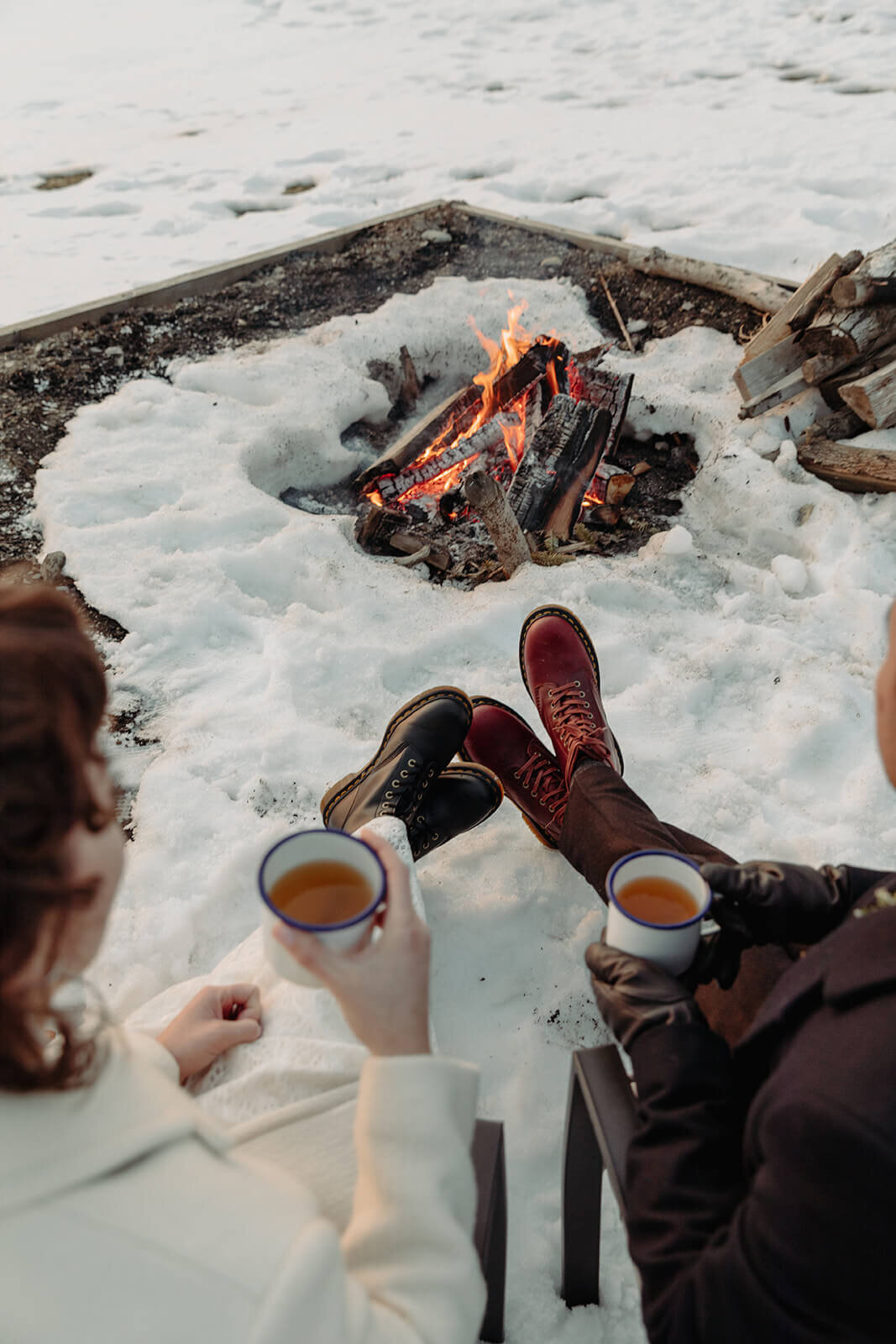  Stylish NYC couple elope late winter in the Finger Lakes region of Upstate NY.  Drinks by the campfire during sunset 