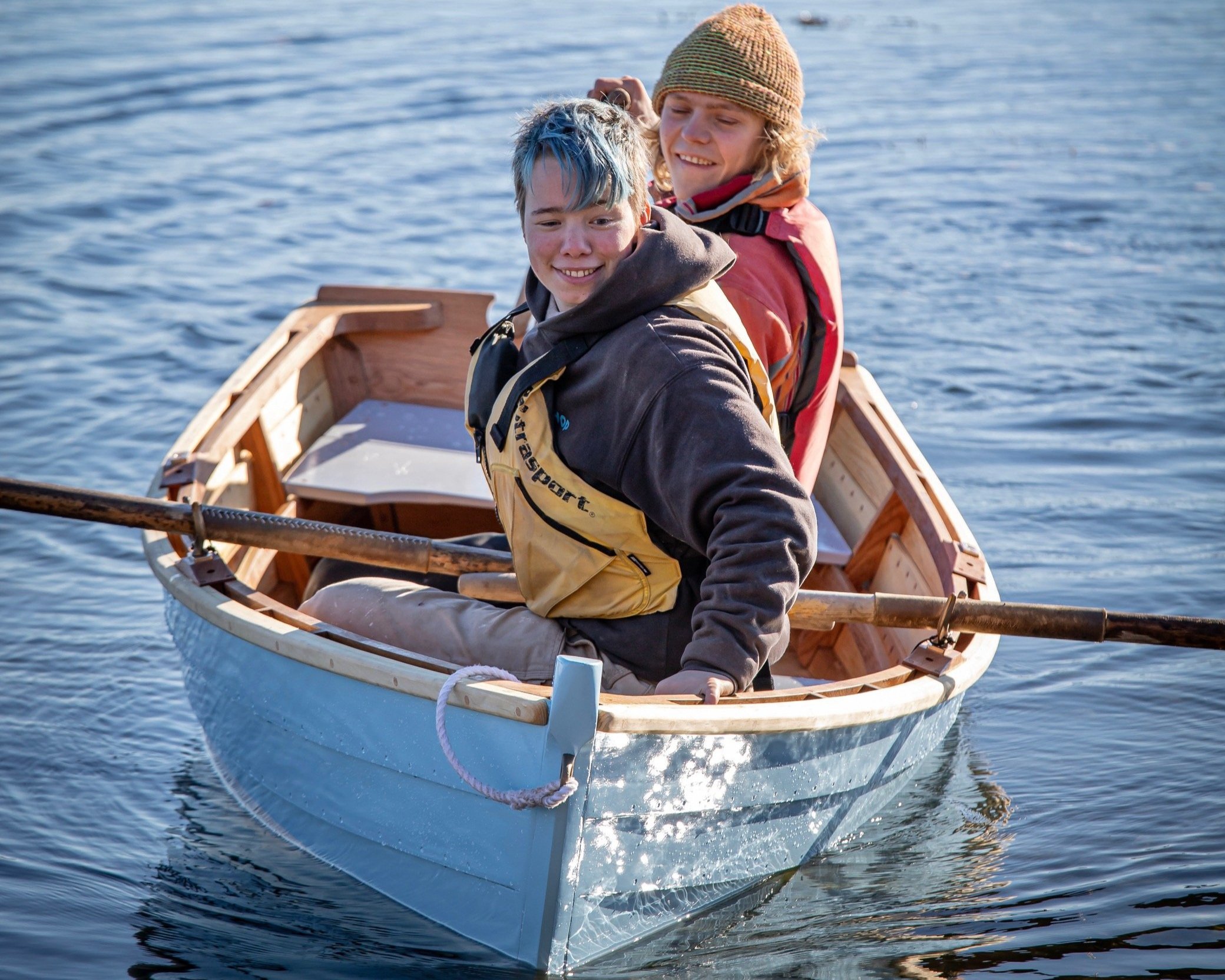 Tabitha and Will take Will's skiff for a spin